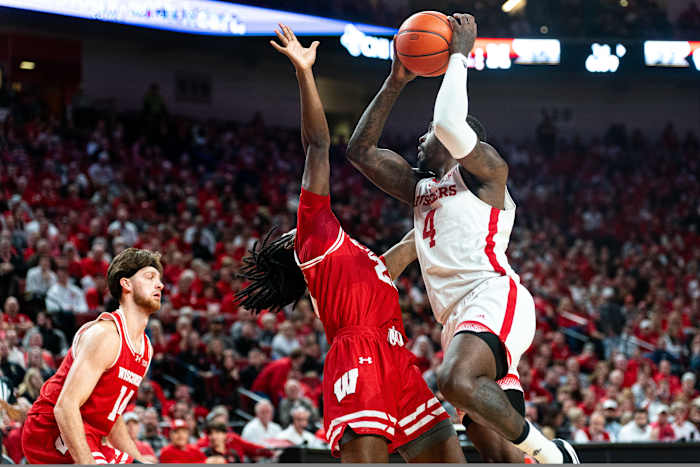 Feb 1, 2024; Lincoln, Nebraska, USA; Nebraska Cornhuskers forward Juwan Gary (4) shoots the ball against Wisconsin Badgers guard John Blackwell (25) during the first half at Pinnacle Bank Arena.